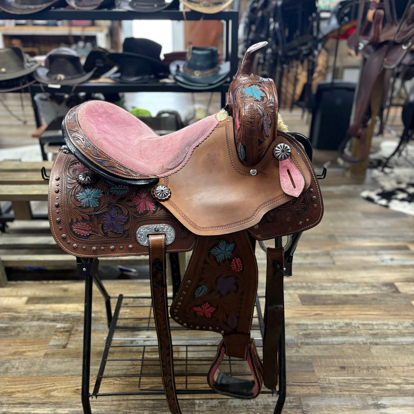 Used 14.5 inch Youth Barrel Saddle Pink Seat, Purple, and Blue Floral Tooling