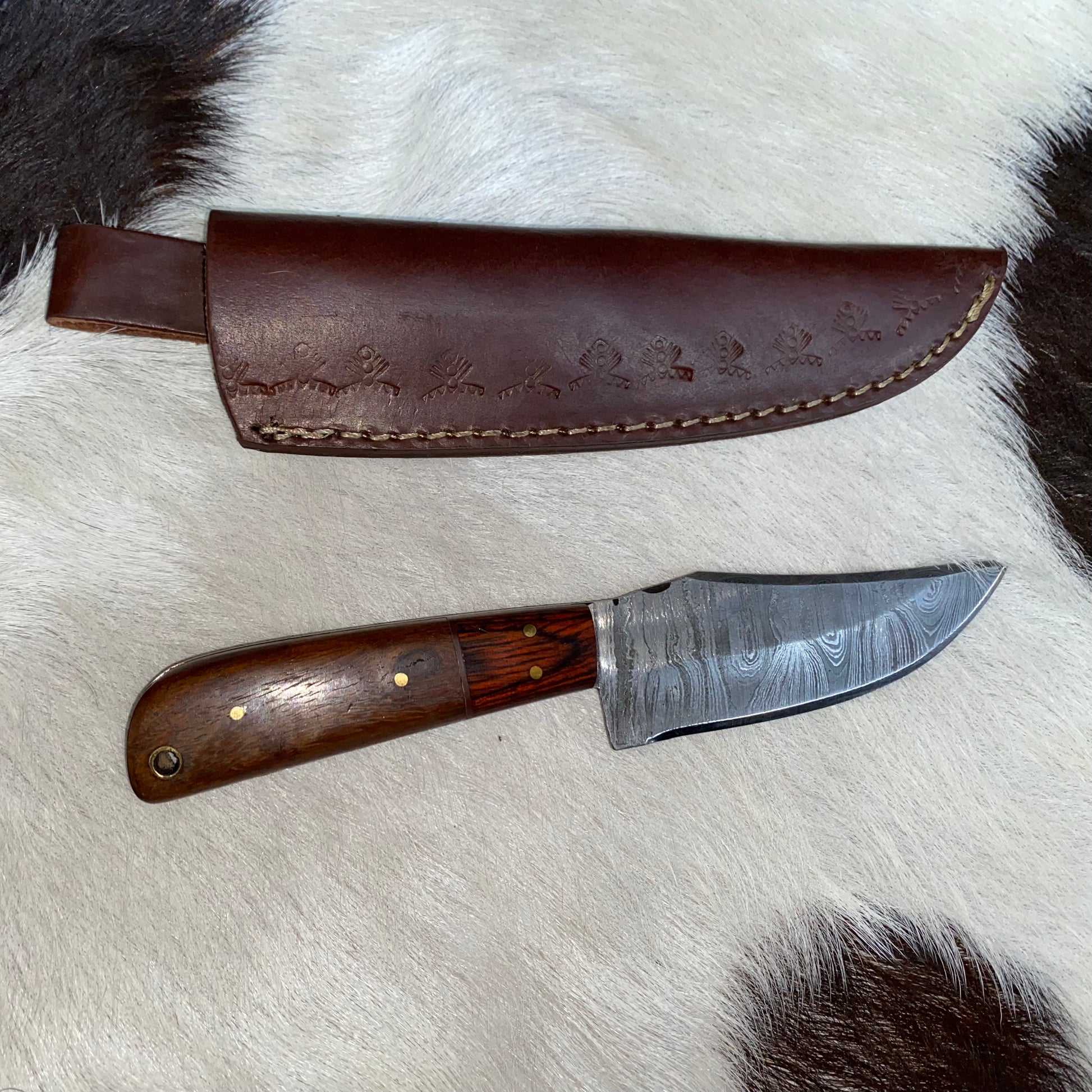 Damascus hand crafted hunting skinner knife for outdoors with leather hand tooled sheath  