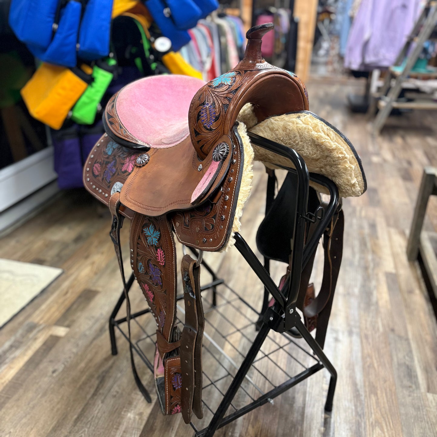 Used 14.5 inch Youth Barrel Saddle Pink Seat, Purple, and Blue Floral Tooling