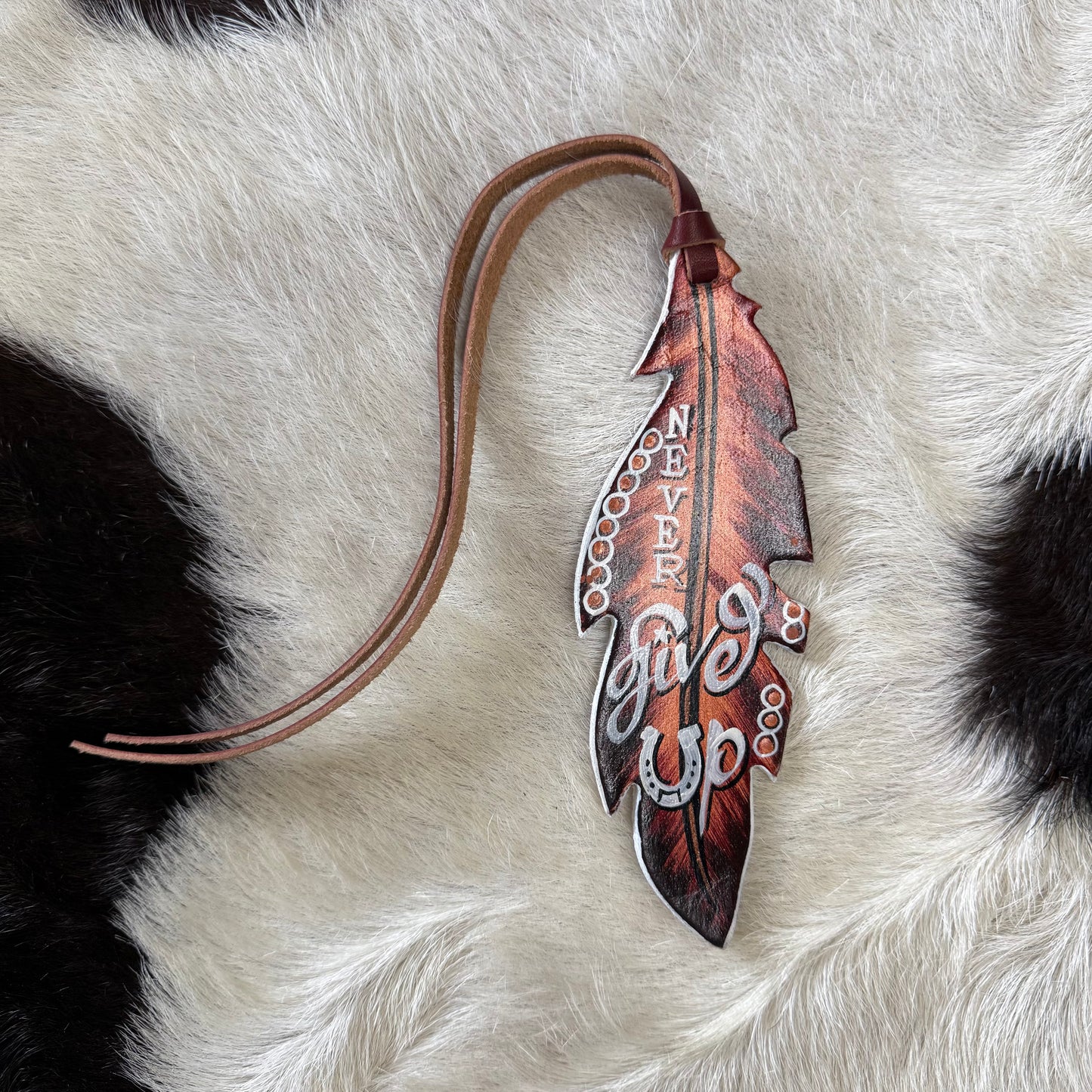 Leather Feather NEVER GIVE UP Tie-On Saddle Charm Amish Crafted